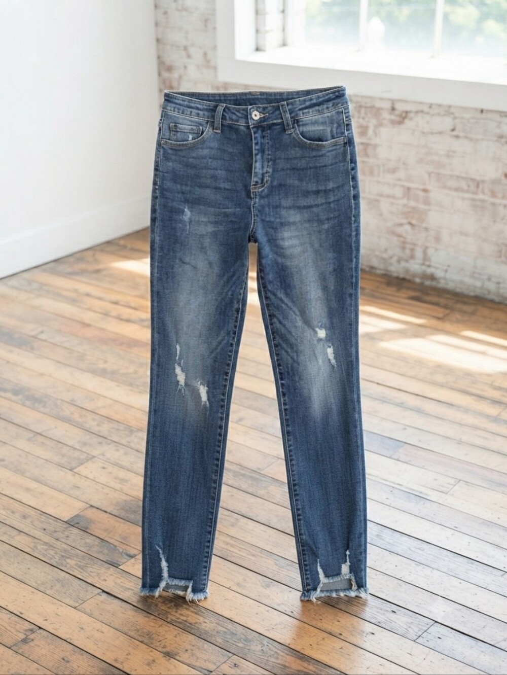 Mid Wash Skinny Women’s Jeans with Distressed Hem